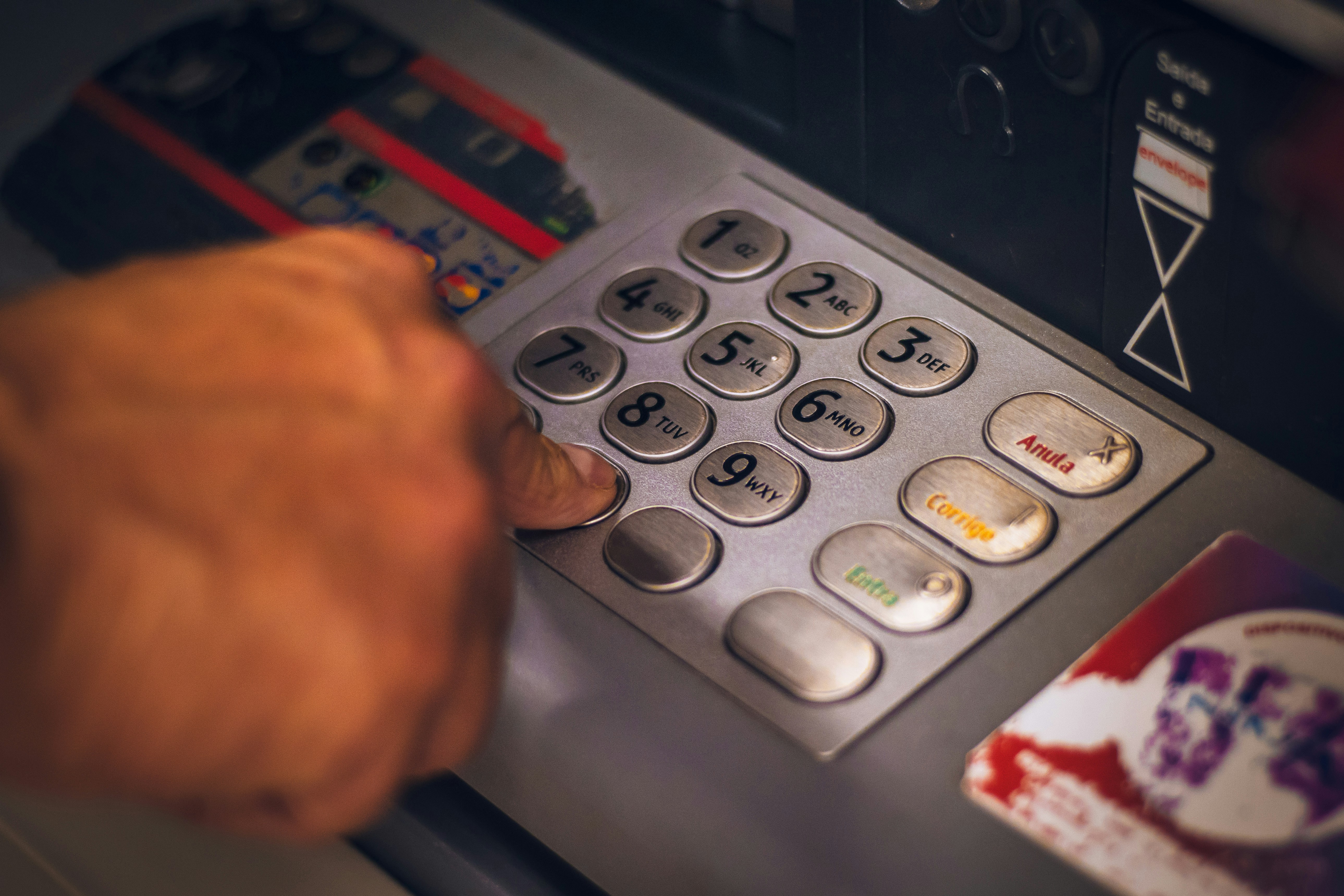 ATM keypad representing the everyday banking infrastructure the company's customers rely on