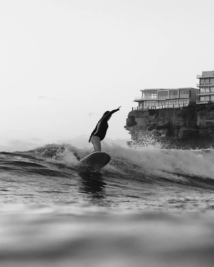 Me surfing at 30 weeks pregnant